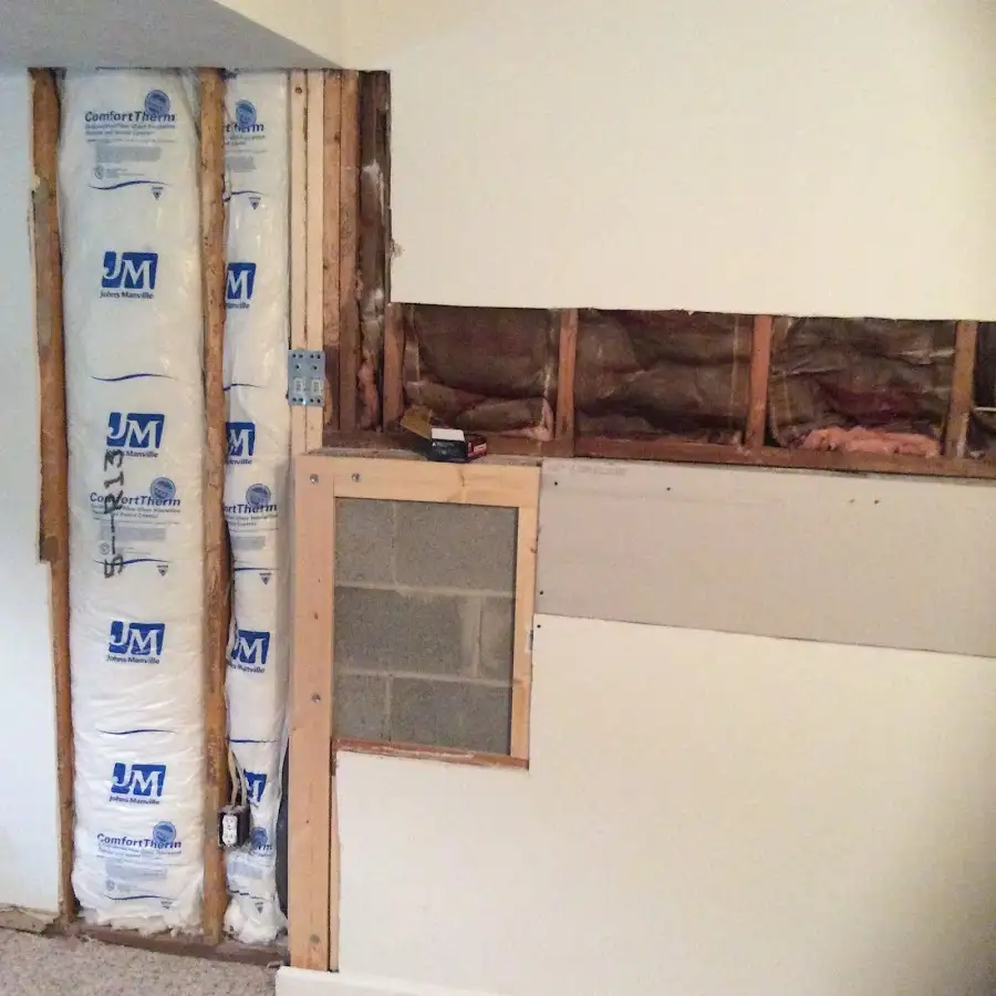 Wall insulation replacement during Basement Flood Cleanup in Kaneohe Base